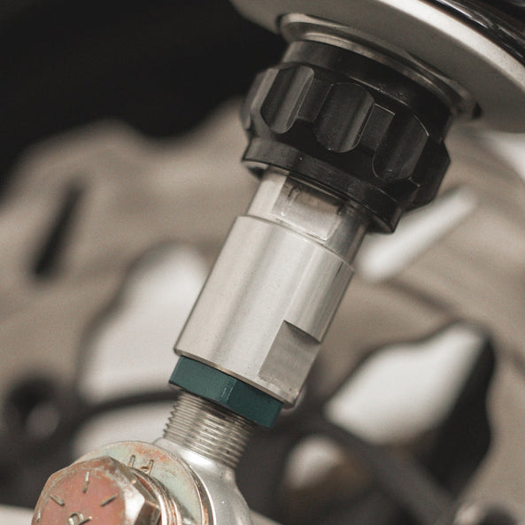 OG Ohlins Rear shocks 1″ Extensions installed on a 2012 Road Glide FLTR