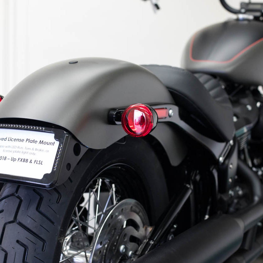 Curved License Plate Relocation For Softails