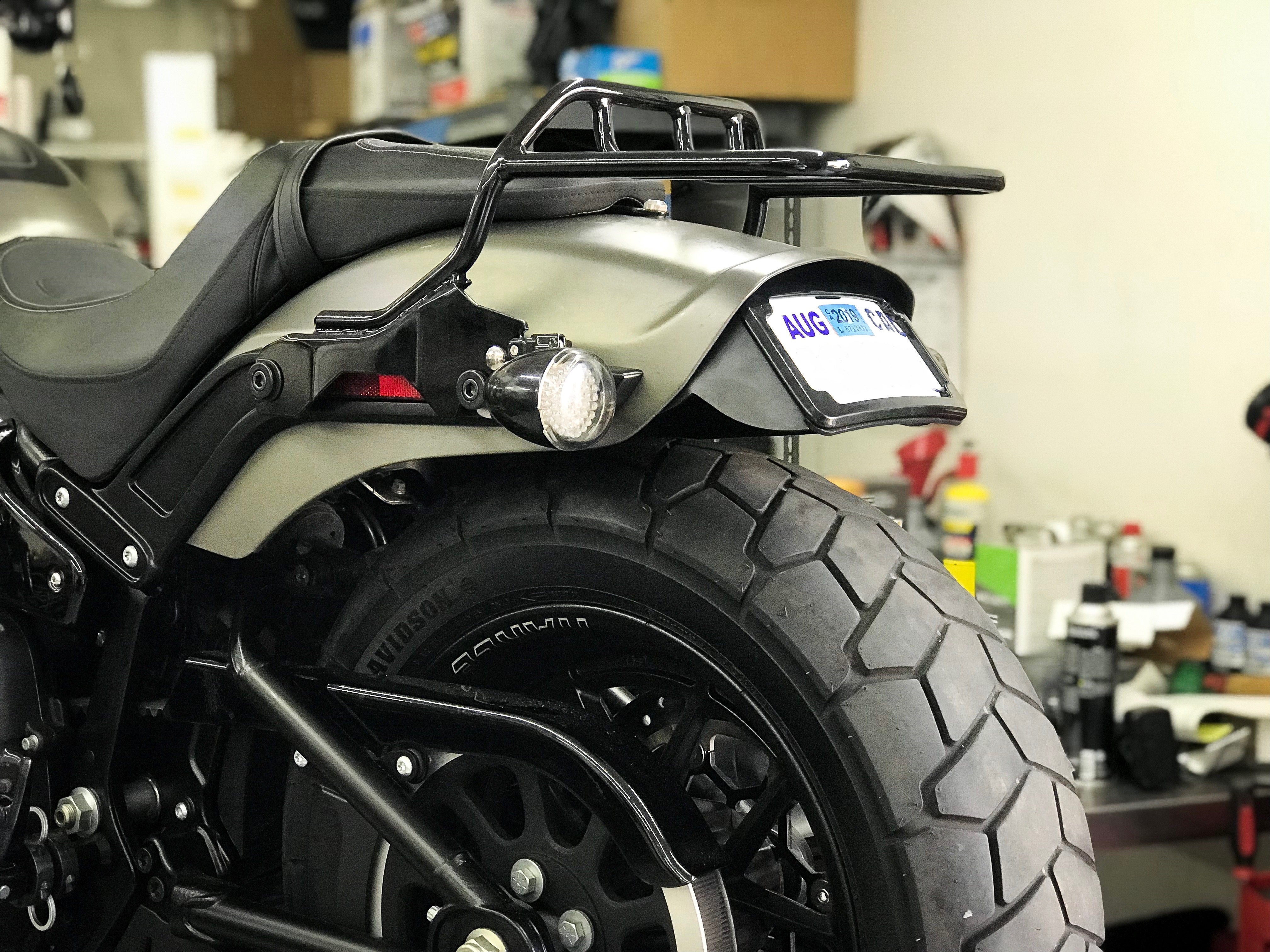 Curved License Plate Relocation For Softails