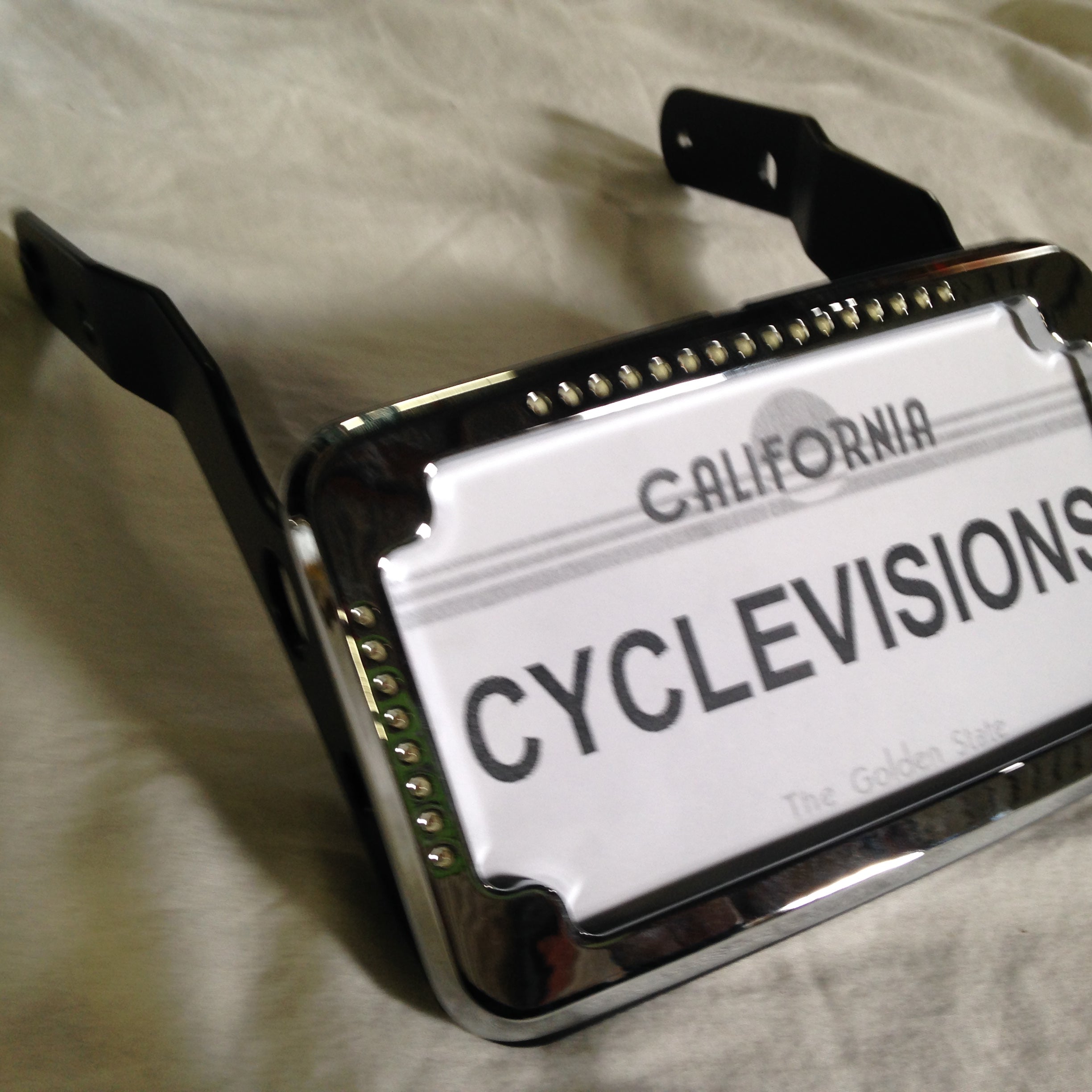 Curved License Plate Relocation for Sportsters