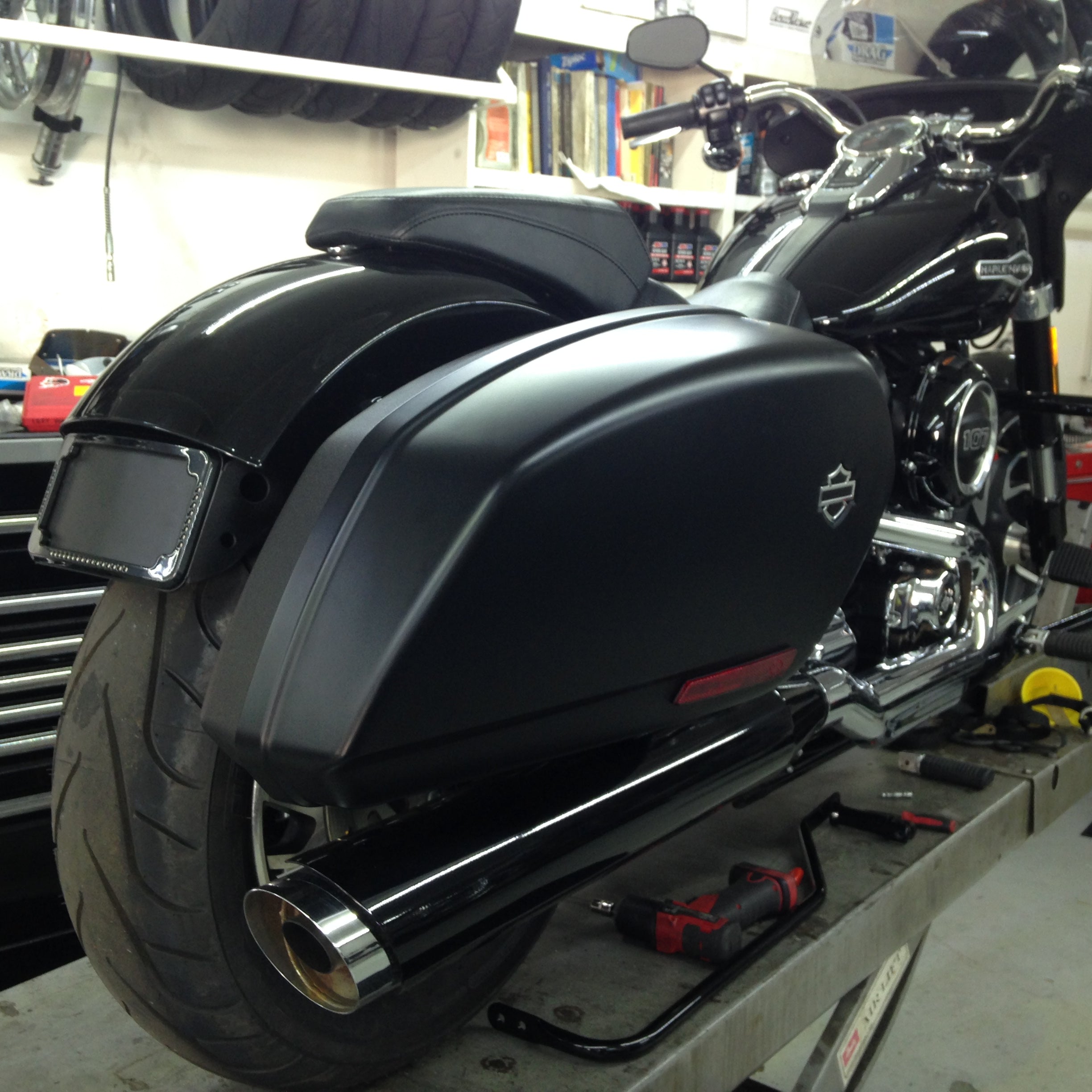 Curved License Plate Relocation For Softails