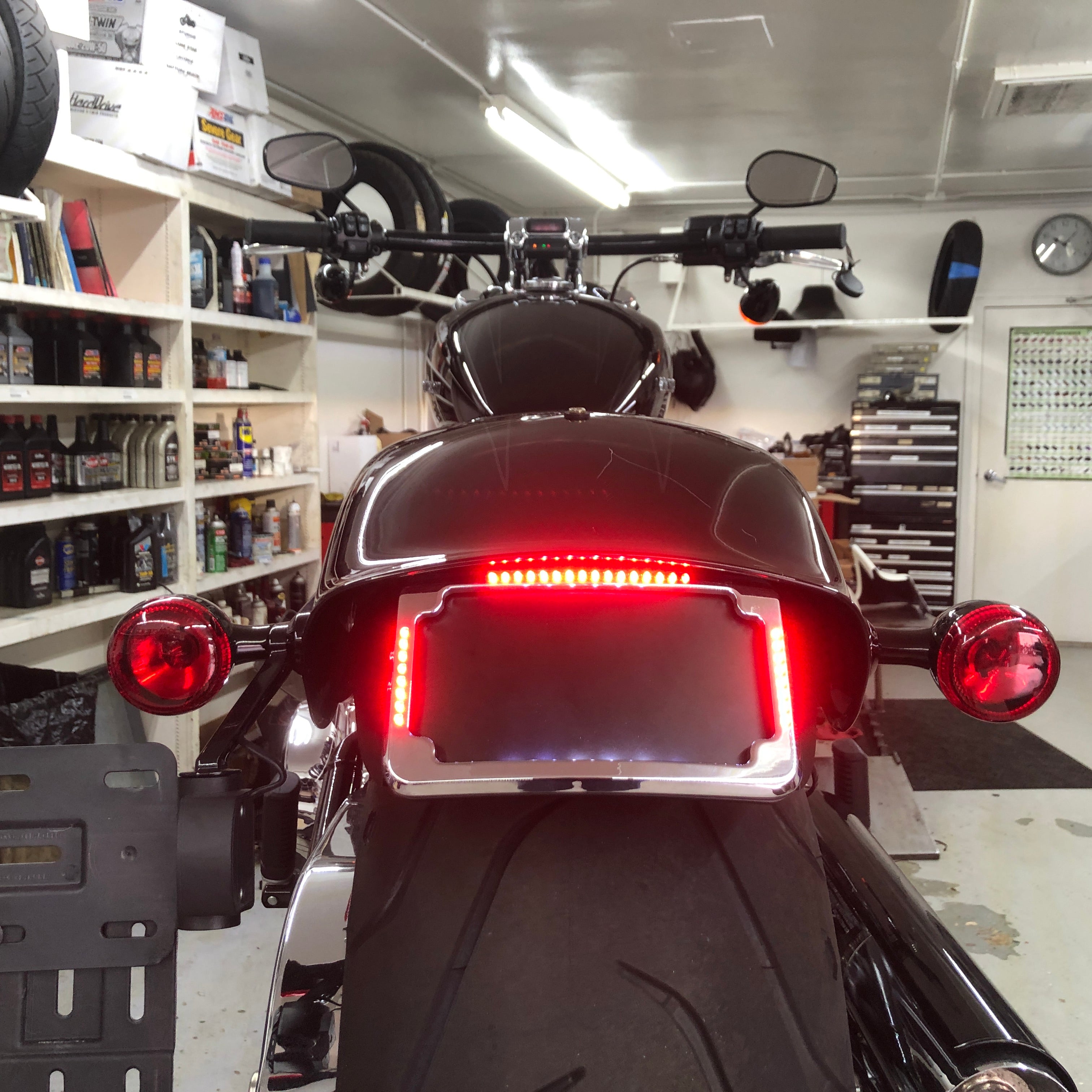 Curved License Plate Relocation For Softails